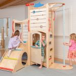 Toddler gym-style play equipment for indoor use.
