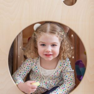 Toddler gym-style play equipment for indoor use.