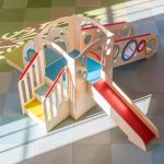 “Baby-friendly mini slide with padded edges.”