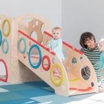 Floor-level baby play equipment for early movement.